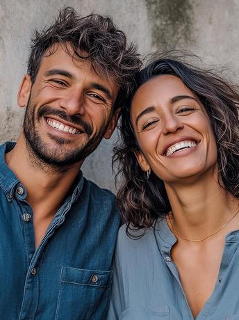Couple with beautiful smiles from professional dental cleaning near Falls Church